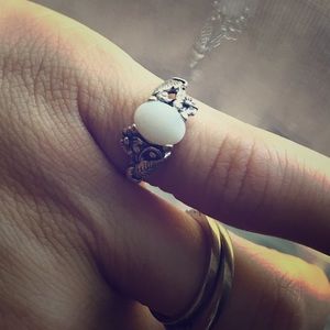 Navajo flower and feather decorated opal ring sz6